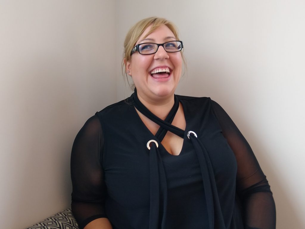 Heather Dejardins, an Ottawa business owner, laughing during a interview.