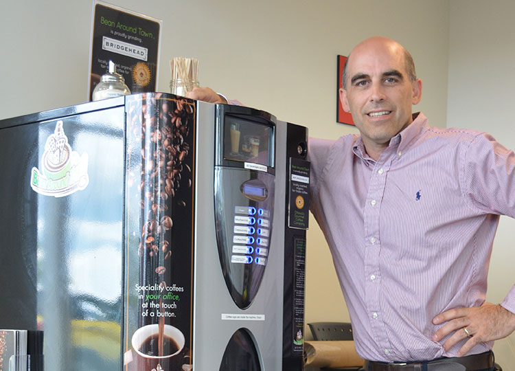 Ed Hemphill with a JBC series coffee machine - as part of the Office Coffee service of Bean Around Town. 