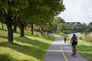 A view of the Capital Pathway being enjoyed by cyclists and pedestrians 