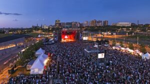 A panorama image of Bluesfest at LeBreton Flats in Ottawa