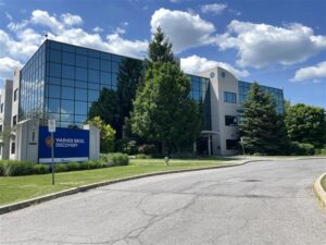 A photo of the Warner Bros. Discovery location in Ottawa on a partially sunny day. 